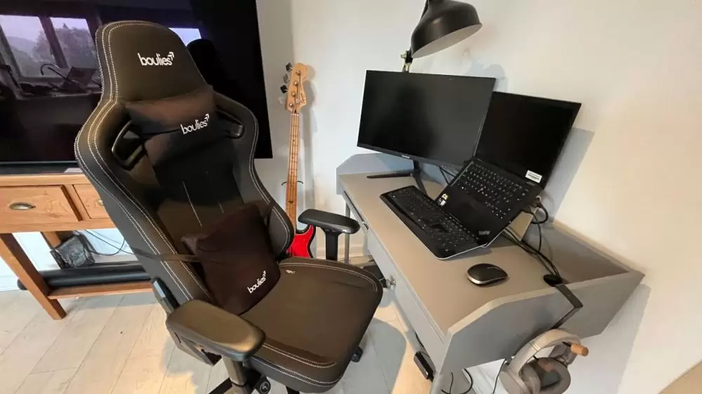 The Boulies Elite Max chair in front of a desk